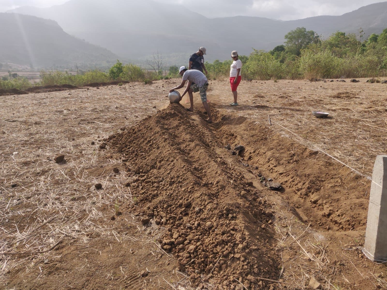 A freshly dug swale ready to harvest rainwater